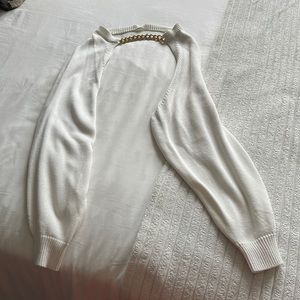 Sweater shrug with gold chain